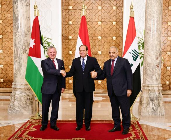 الرئيس السيسي والعاهل الاردني ورئيس الوزراء العراقي