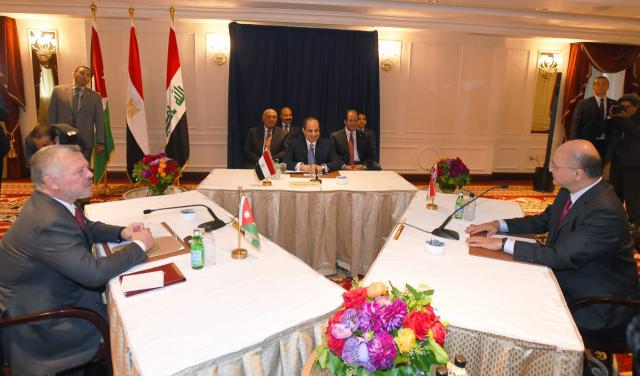 الرئيس السيسي وملك الأردن والرئيس العراقي