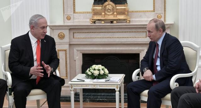 بوتين أثناء اجتماعه مع نتنياهو