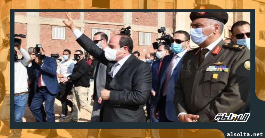 الرئيس يصطحب اعضاء الحكومة من السادة الوزراء ورئيس الوزراء في جولة تفقدية داخل منطقة عزبة الهجانة